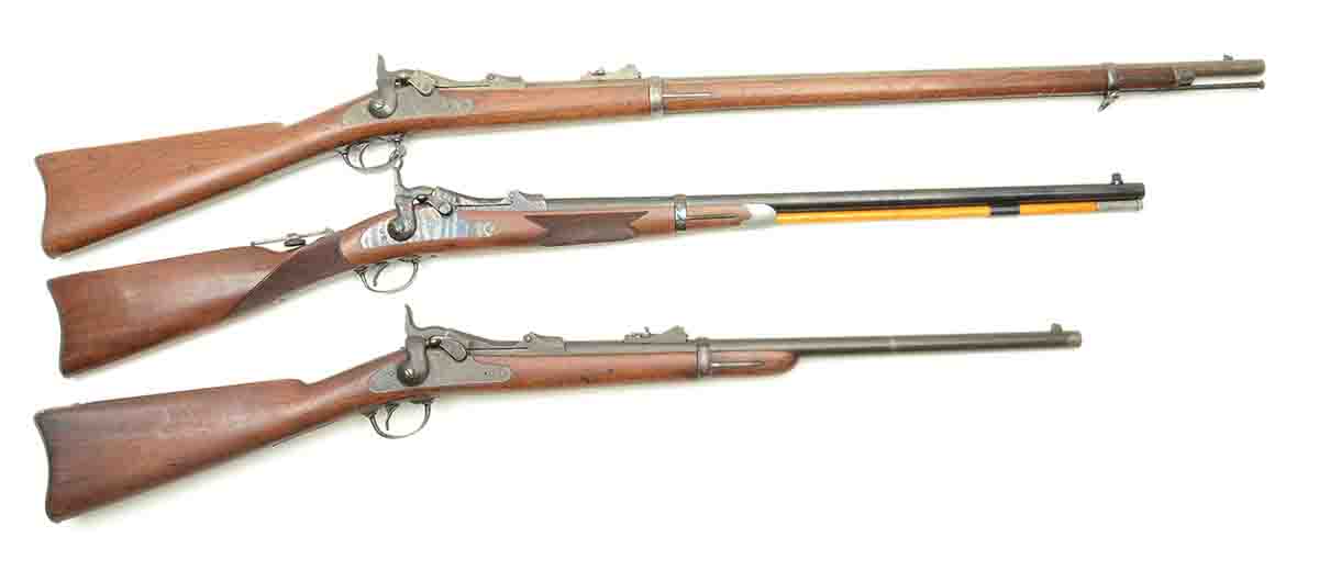 Top to bottom: A Model 1873 infantry rifle, a Harrington & Richardson “Officer’s Model” reproduction made in the 1970s and a Model 1873 cavalry carbine.